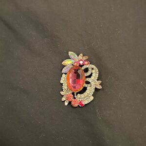 Elegant Crystal Brooch with Pink and Gold Accents
